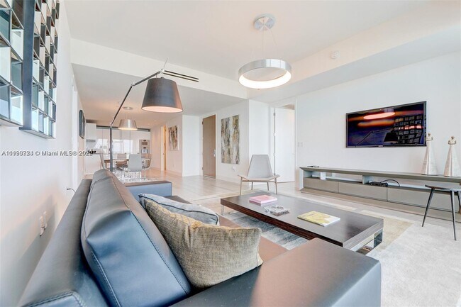 Building Photo - 10203 Collins Ave