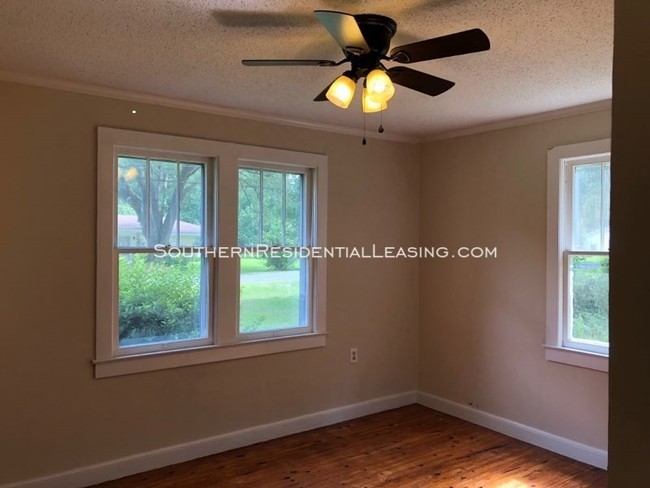 Building Photo - 111 Orange Ave Satsuma ~ by Southern