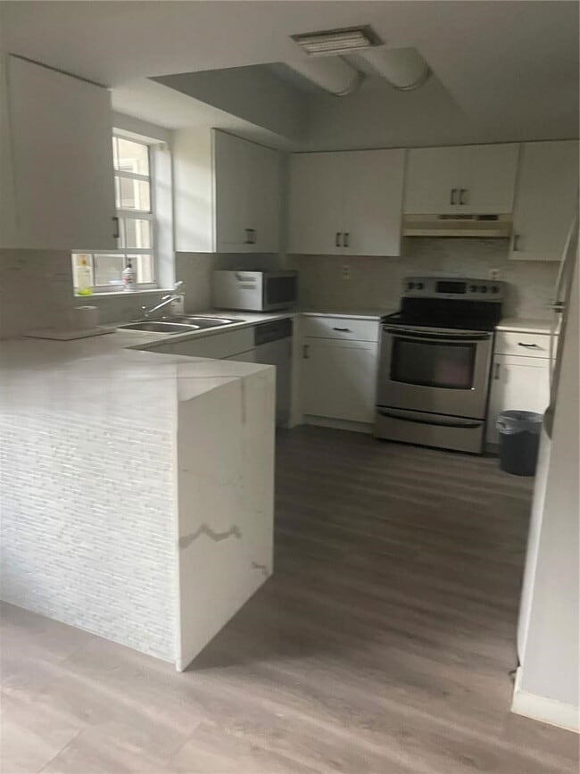 Building Photo - 12390 SW 51st Pl