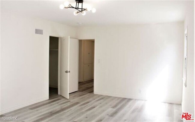 Building Photo - 3 br, 2 bath House - 1122 S Rimpau Blvd