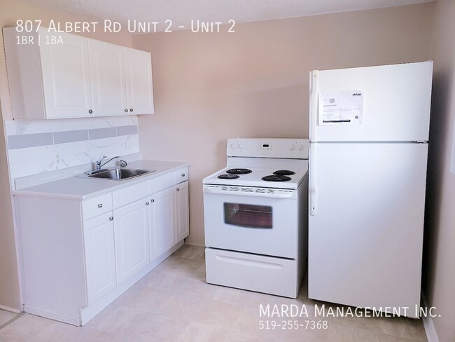 Building Photo - COZY OPEN CONCEPT 1BED/1BATH APRTMENT -ALL...