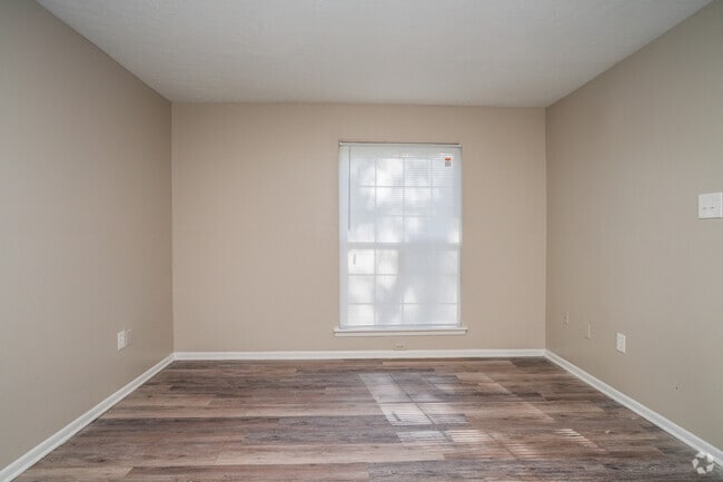 Casa adosada - 920 pies cuadrados - Sala de estar - Meadow Creek Apartments