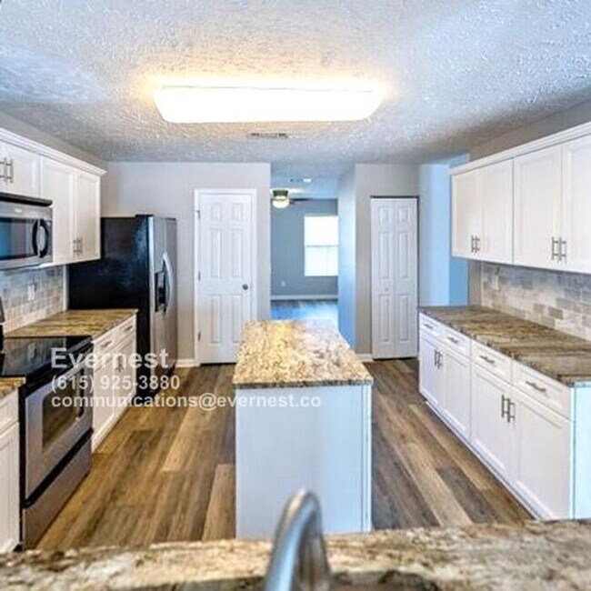 Building Photo - Spacious 4-Bedroom Home with Modern Amenit...