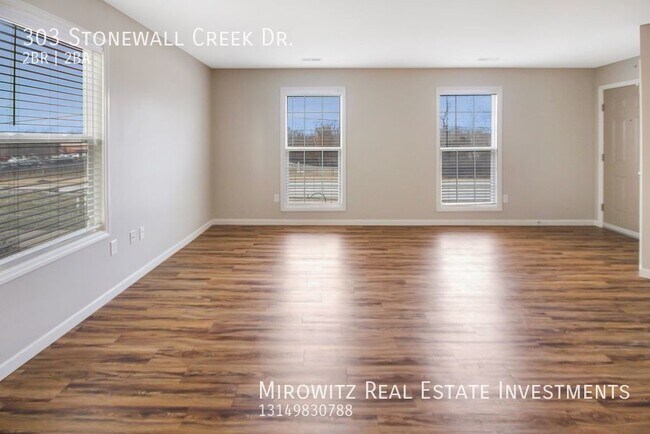 Foto del edificio - 303 Stonewall Creek Dr