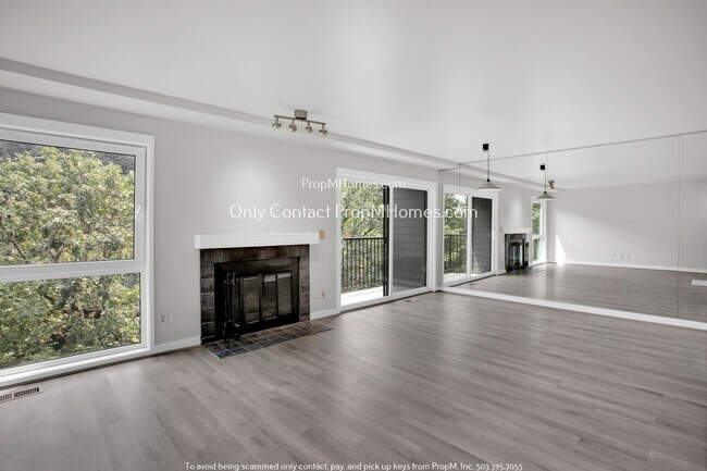 Building Photo - Charming Condo with Covered Parking and Tr...