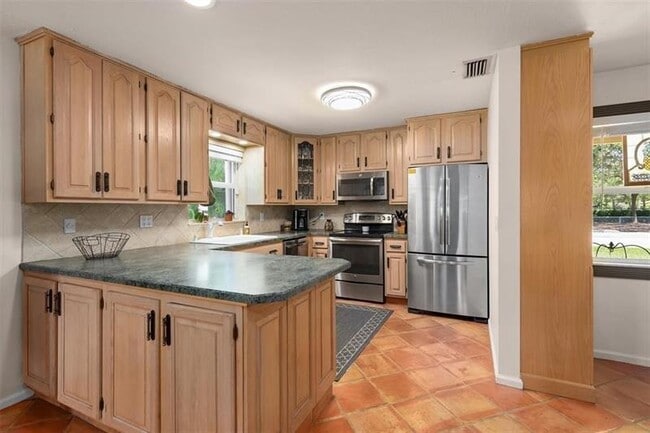 Building Photo - 8590 NW 38th Dr