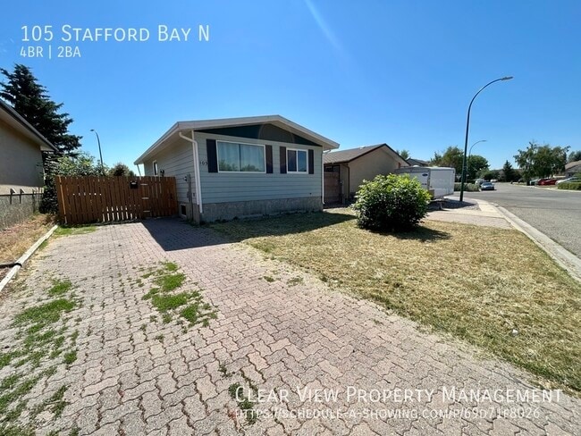 Building Photo - Perfect Fully Fenced family home in North Lethbridge with AC!!  **PROMO: 1ST HALF MONTH FREE