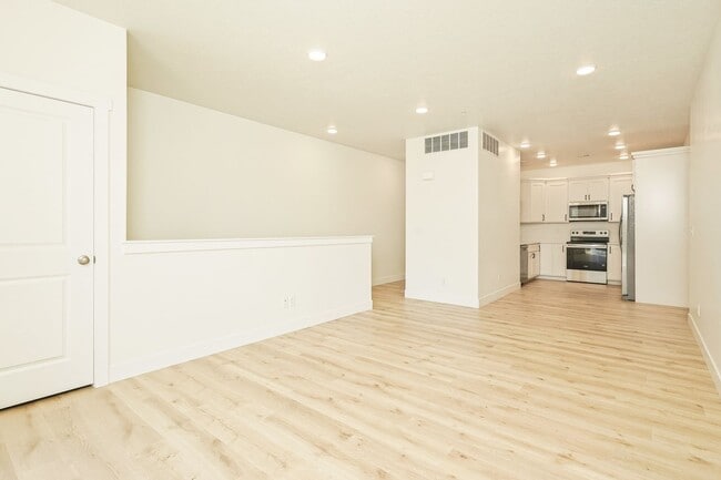 Building Photo - Welcome home to this beautifully designed 3-bedroom, 2-bathroom new construction townhome in one ...