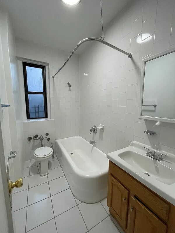 Building Photo - 37-47-47 61st St