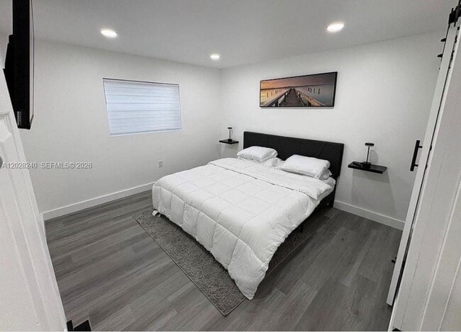 Building Photo - 4265 NW S Tamiami Canal Dr