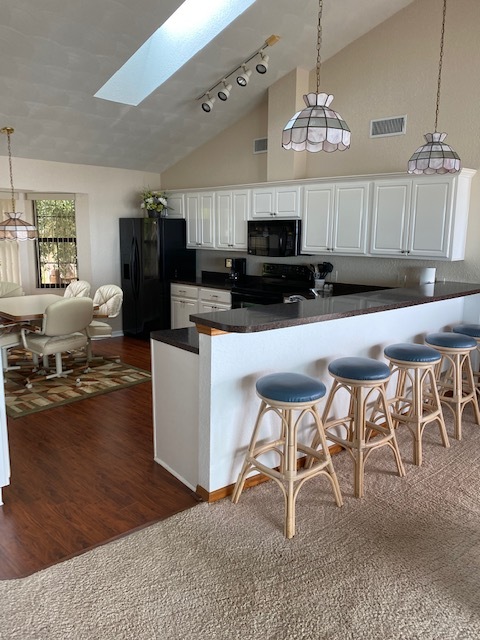 Kitchen with view of the Banana River - 980 S Banana River Dr