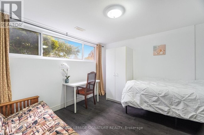 Photo du bâtiment - 406 Tamarack Dr