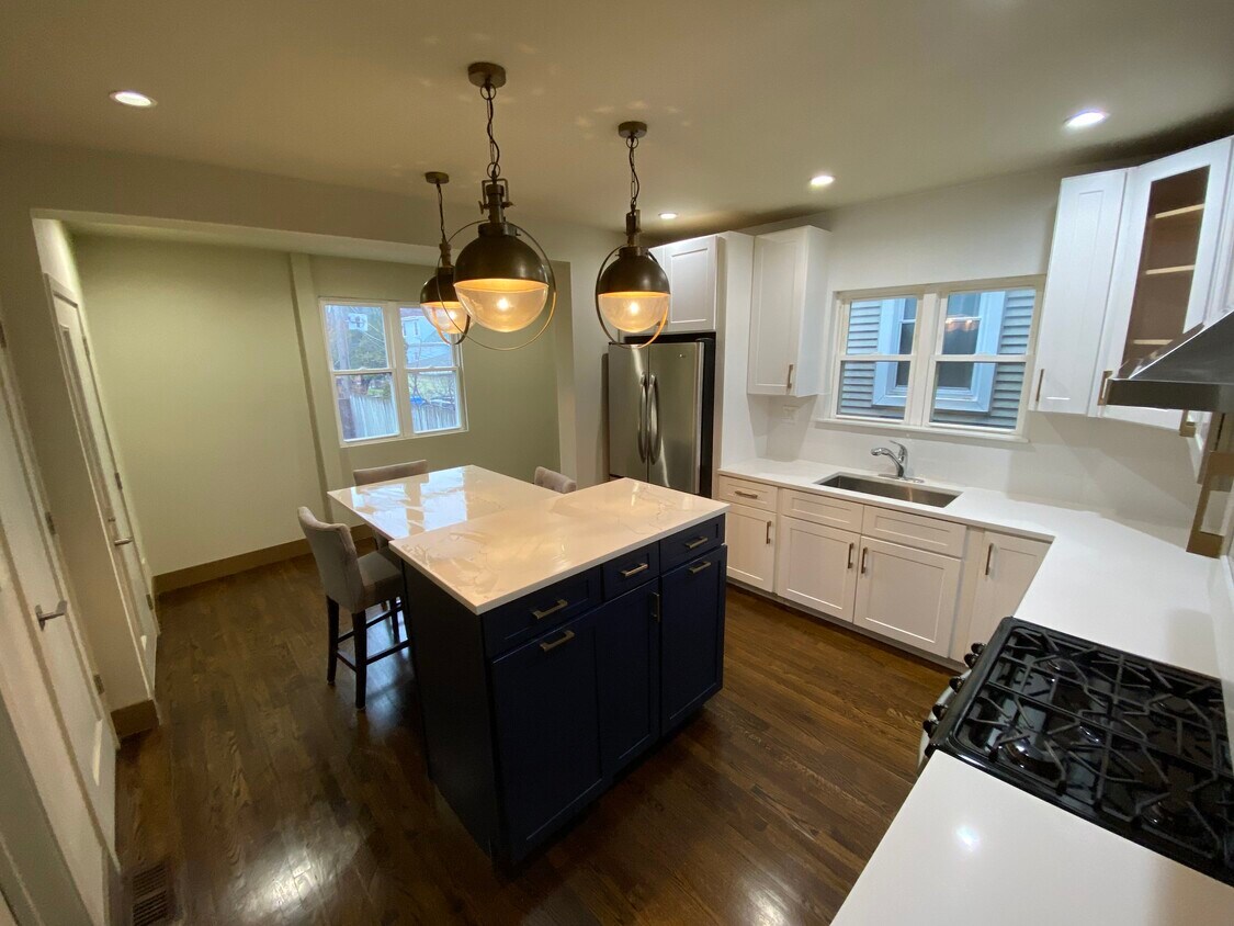 Open and updated eat in kitchen - 2850 W Henderson St