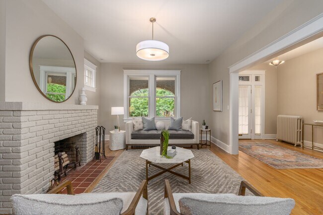 Building Photo - Charming Townhome | 5 Bed | 3.5 Bath | 2,400 Sf | Covered Front Porch & Large Fenced-In Backyard ...
