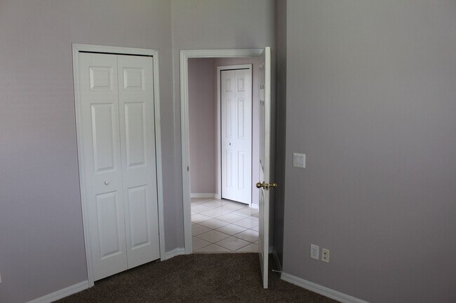Building Photo - Freshly painted, four bedroom home availab...