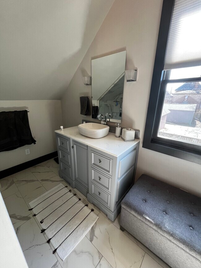 one of two vanities in master bath - 605 Lord St