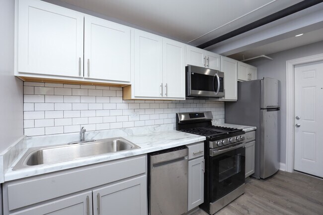 Building Photo - 1253 W Rosemont Ave