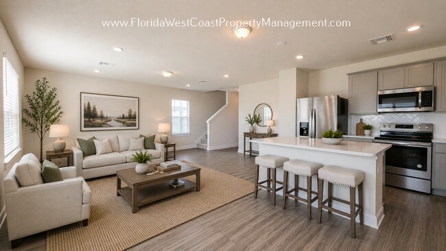 Foto del edificio - OUTSTANDING LARGE 4 BEDROOM/ 3 BATH HOME IN ISLES AT BAYVIEW! LARGE FLEX SPACE PLUS LAKEIVEWS!