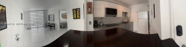 Building Photo - 5555 Collins Ave