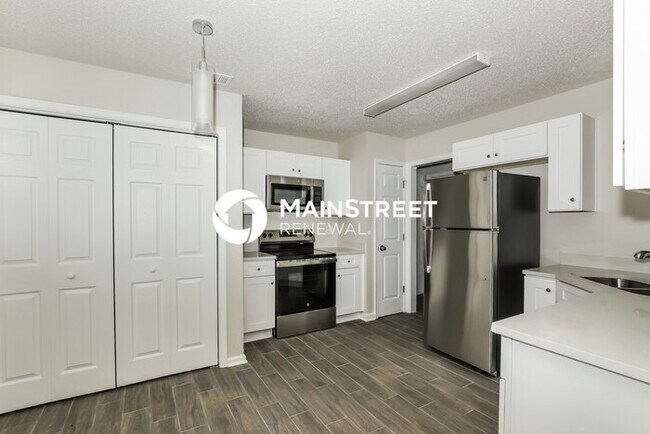 Building Photo - 4 Bedroom Pet-Friendly Home in JONESBORO, GA with Main Street Renewal