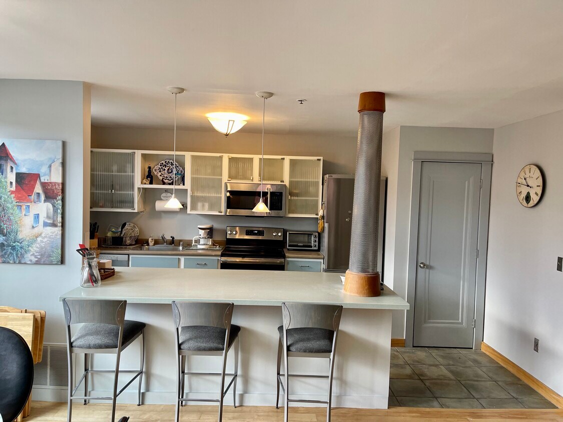 Open Kitchen stocked with all the essentials (view from living room) - 230 College St
