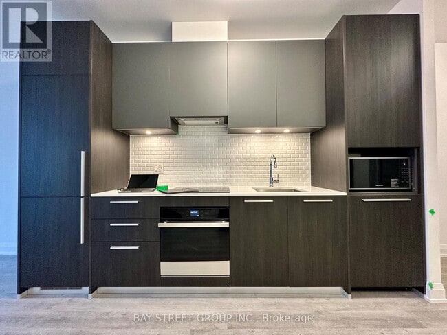 Building Photo - 65 Broadway Ave