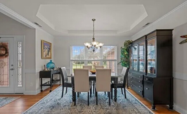 Building Photo - **Stately Brick Home in Fairfield Harbour | Tray Ceiling, Column, Bonus Room & Screened Porch**