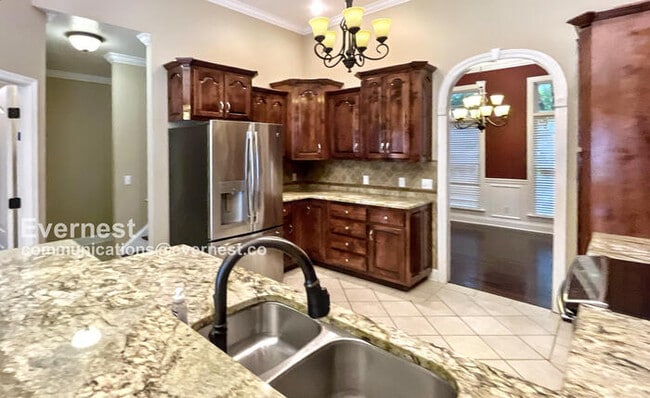 Building Photo - Elegant 4-Bedroom, 2-Bathroom Home, Golf c...