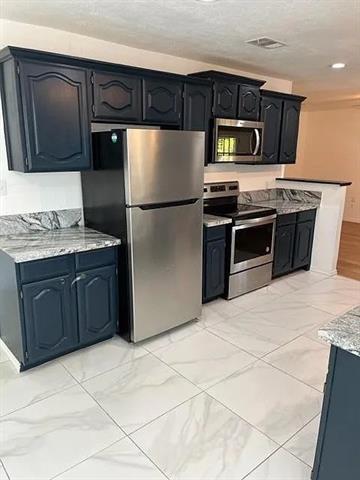 Foto del edificio - 6524 Blue Grass Dr
