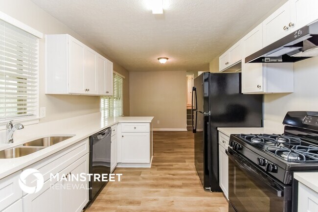 Foto del edificio - 5613 Woodland Dr