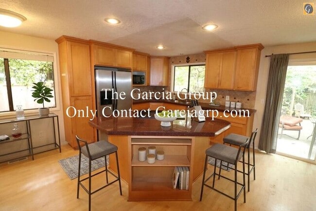 Building Photo - 9585 SW New Forest Dr
