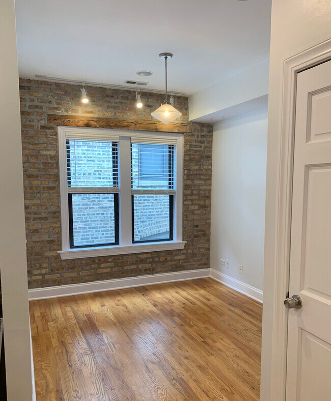 Building Photo - 1360 W Estes Ave