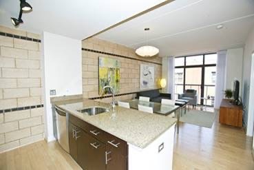 Kitchen bar, small dining area. - 1529 14th St NW