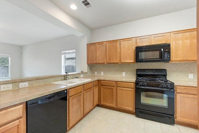 Foto del edificio - 831 Honeysuckle Vine Dr