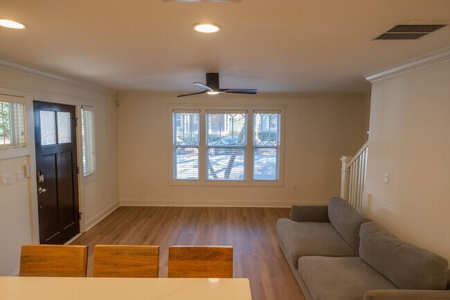 Building Photo - The Woodlands Unit 105