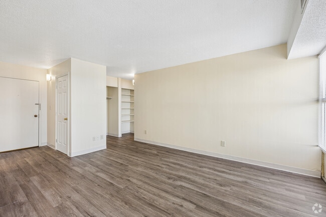 1BR, 1BA - 650SF - Living Room - Courtview Towers