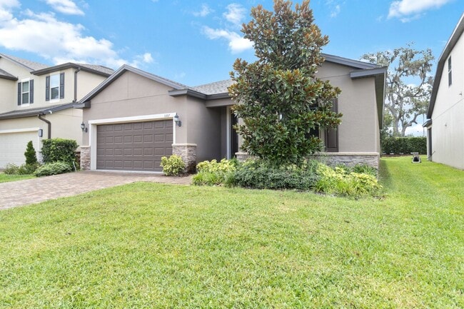 Building Photo - MOVE IN SPECIAL-Gorgeous Energy Efficient 4/2 Home in Gated Community Close to Lake Nona