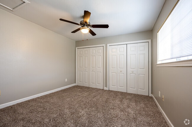 2BR, 1.5BA - 1,050SF - Primary Bedroom - Cypress Lane