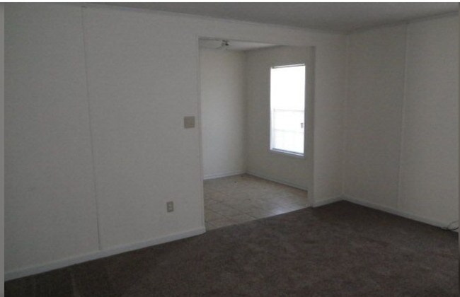 Livingroom leads to eat in kitchen. - 1232 12th St