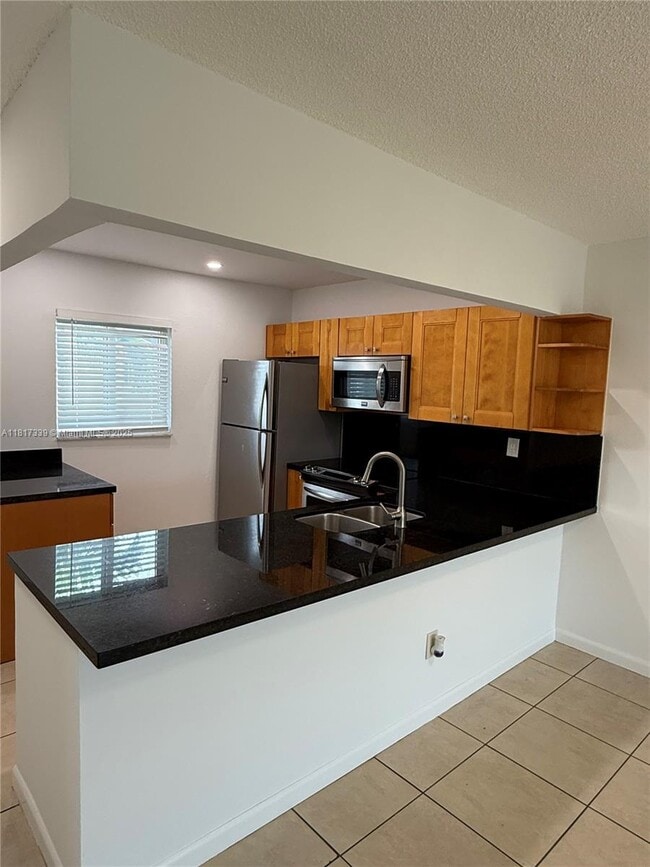 Building Photo - 7700 Camino Real