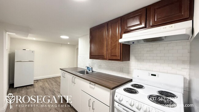 Photo du bâtiment - Newly Renovated 1-Bedroom Basement Unit in...