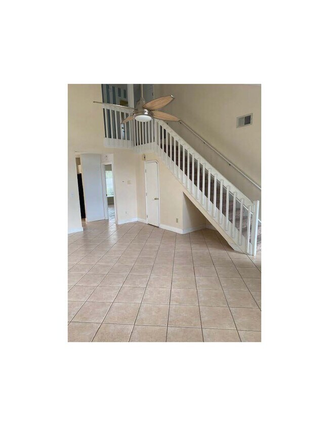 living dining- half bath under stairs - 9413 Bud Wood St