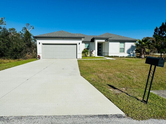 Foto del edificio - Charming 4 Bedroom, 2 Bathroom Home in Poi...