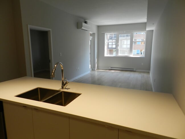 Building Photo - WELCOME TO THE UPSIDE - ONE BEDROOM PLUS DEN APARTMENT AVAILABLE