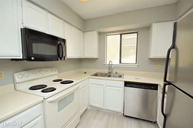 Building Photo - 2 br, 2.5 bath House - 9606 Woodvale Dr