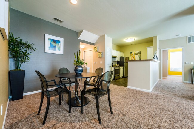 Open Floor Plan Dining Area and Kitchen - Columns on Wetherington Apartments