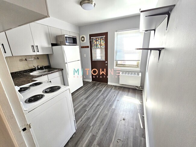 Foto del edificio - 2115-2123 W Farragut Ave