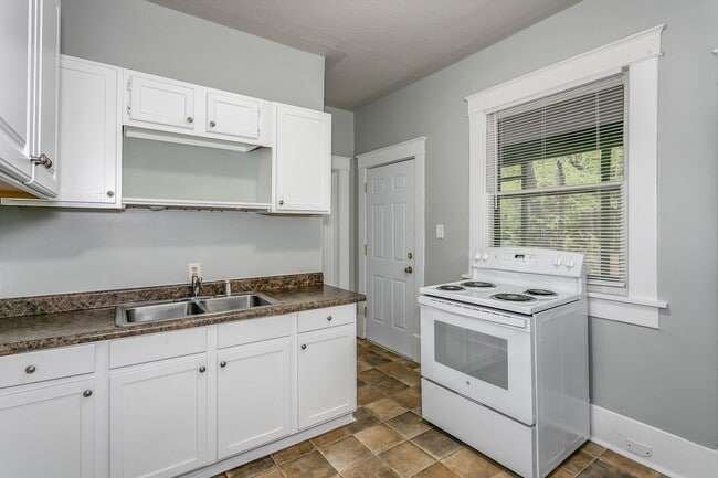 Building Photo - Affordable, spacious and charming - the pe...