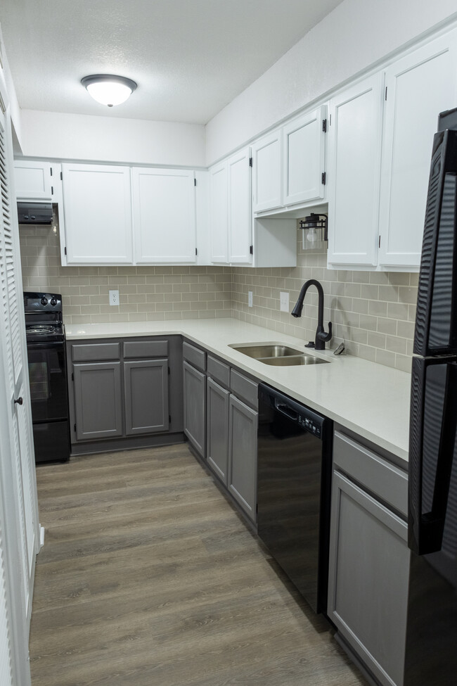 1BR/1.5BA KITCHEN - College Hill Flats