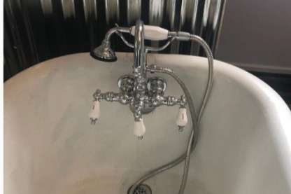 Claw foot tub - 131 S 7th St